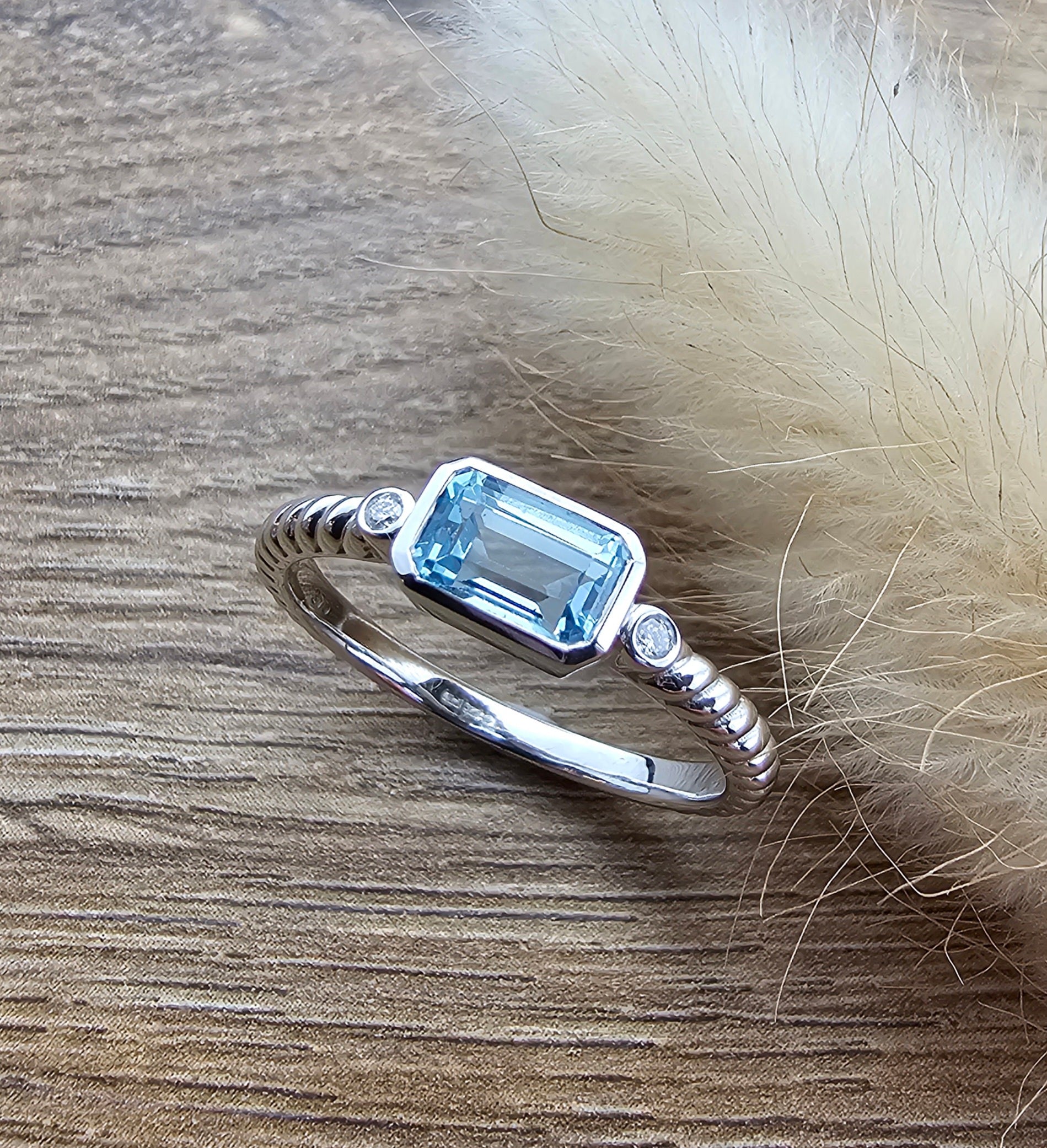 Octagonal blue topaz ring