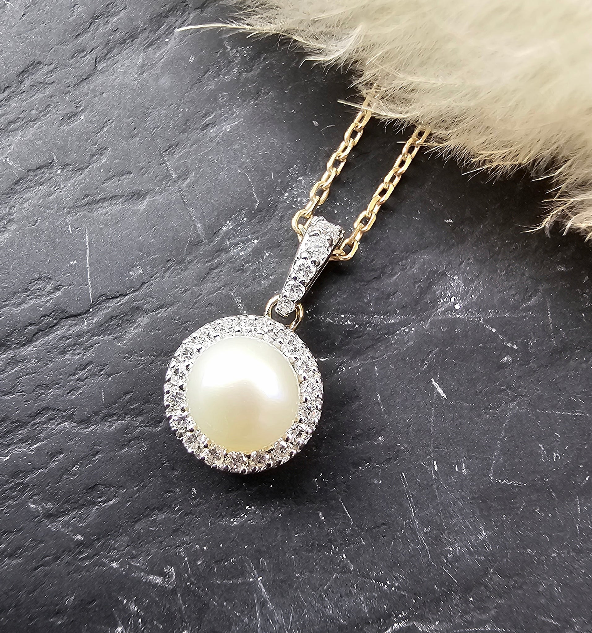 Pearl and diamond halo pendant