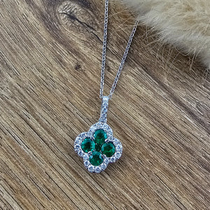 Clover shaped emerald pendant