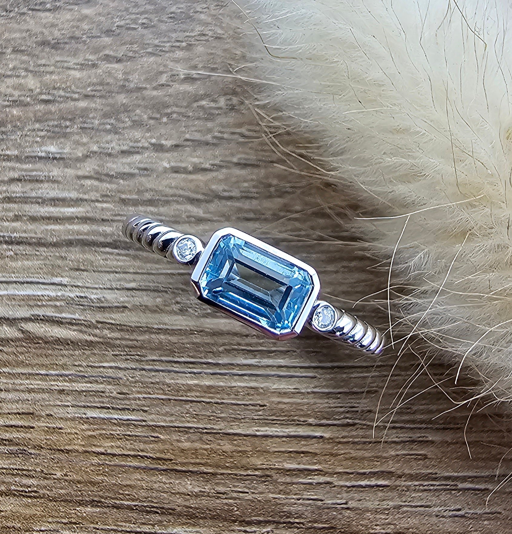 Octagonal blue topaz ring