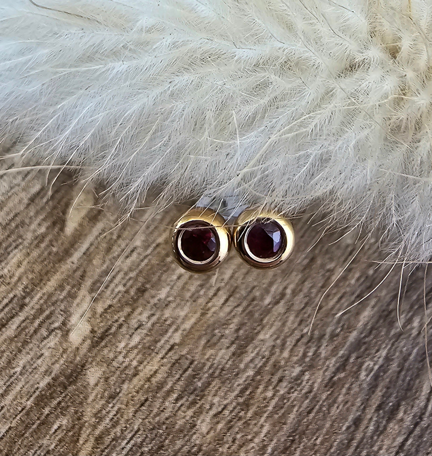 Round rubover ruby stud earrings