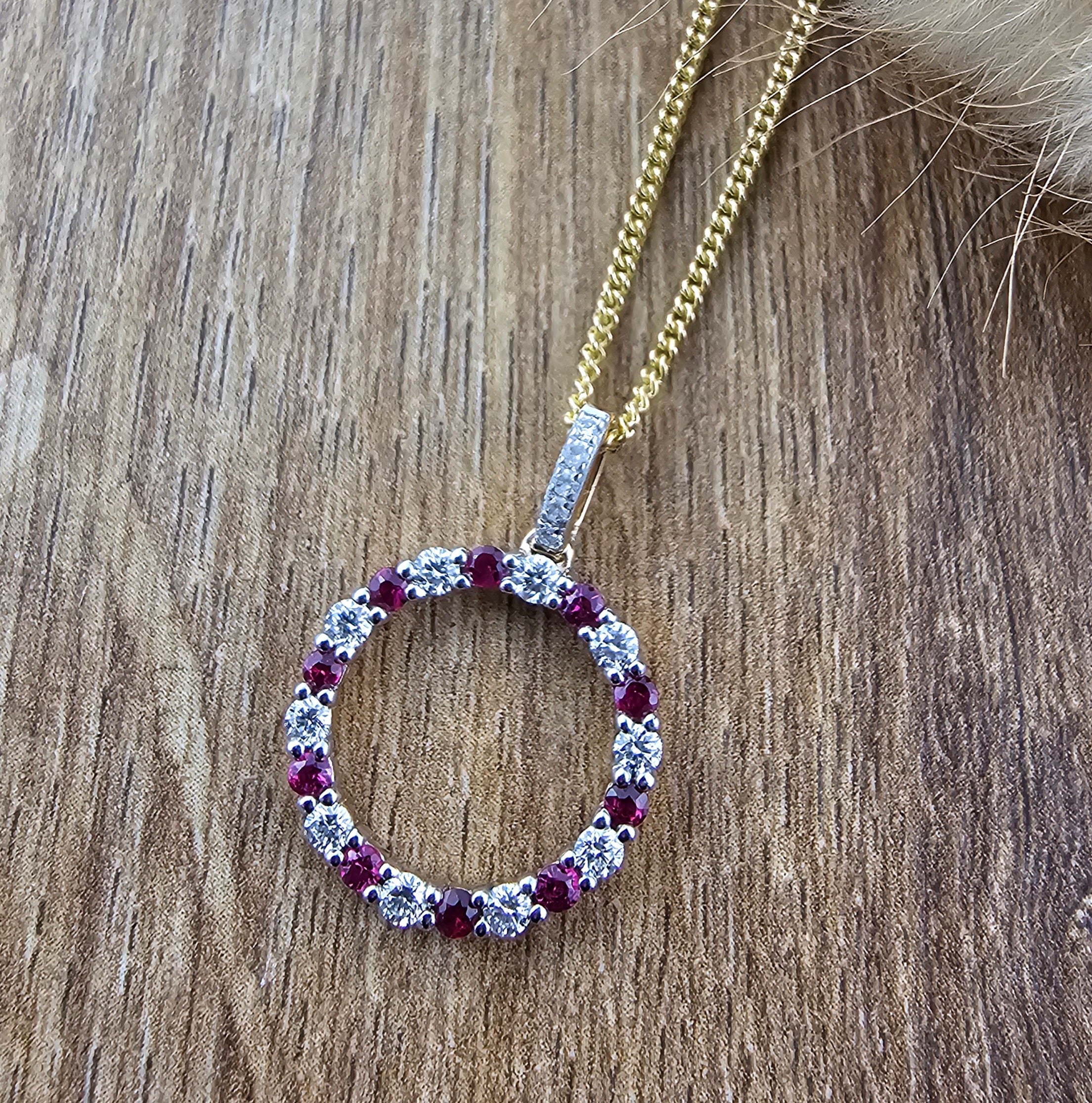 Ruby and diamond circle pendant