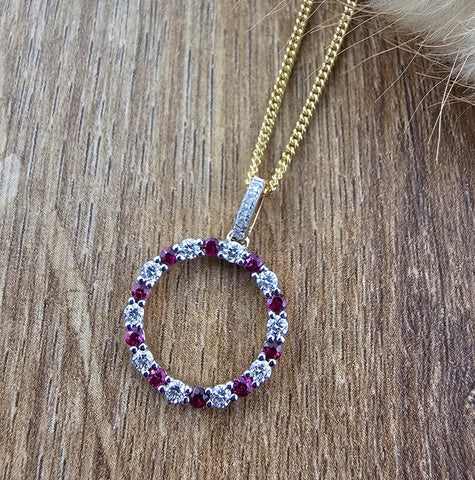 Ruby and diamond circle pendant