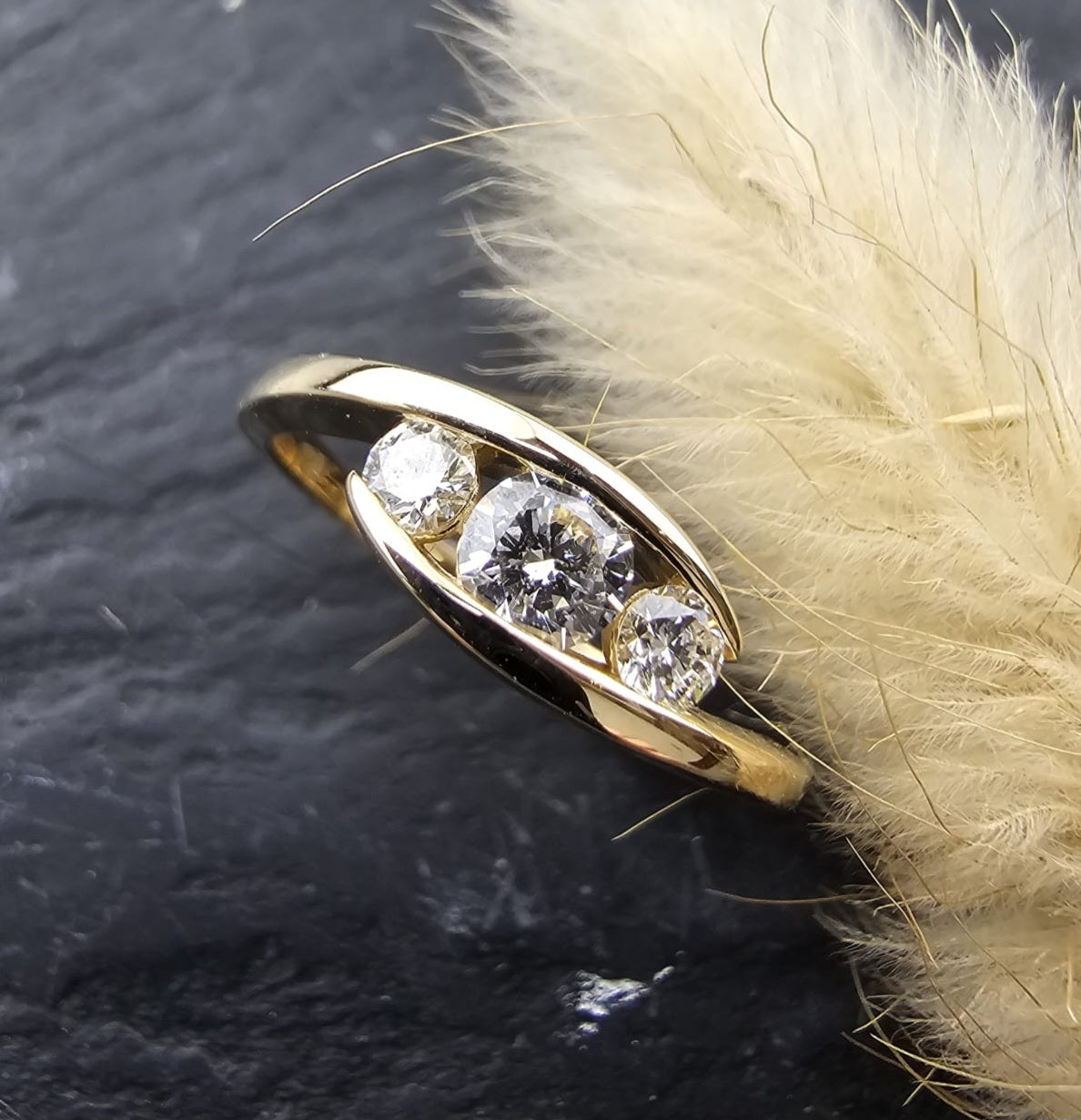 Diamond trilogy tension set ring