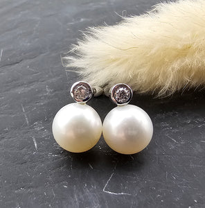 Round Pearl and diamond stud earrings