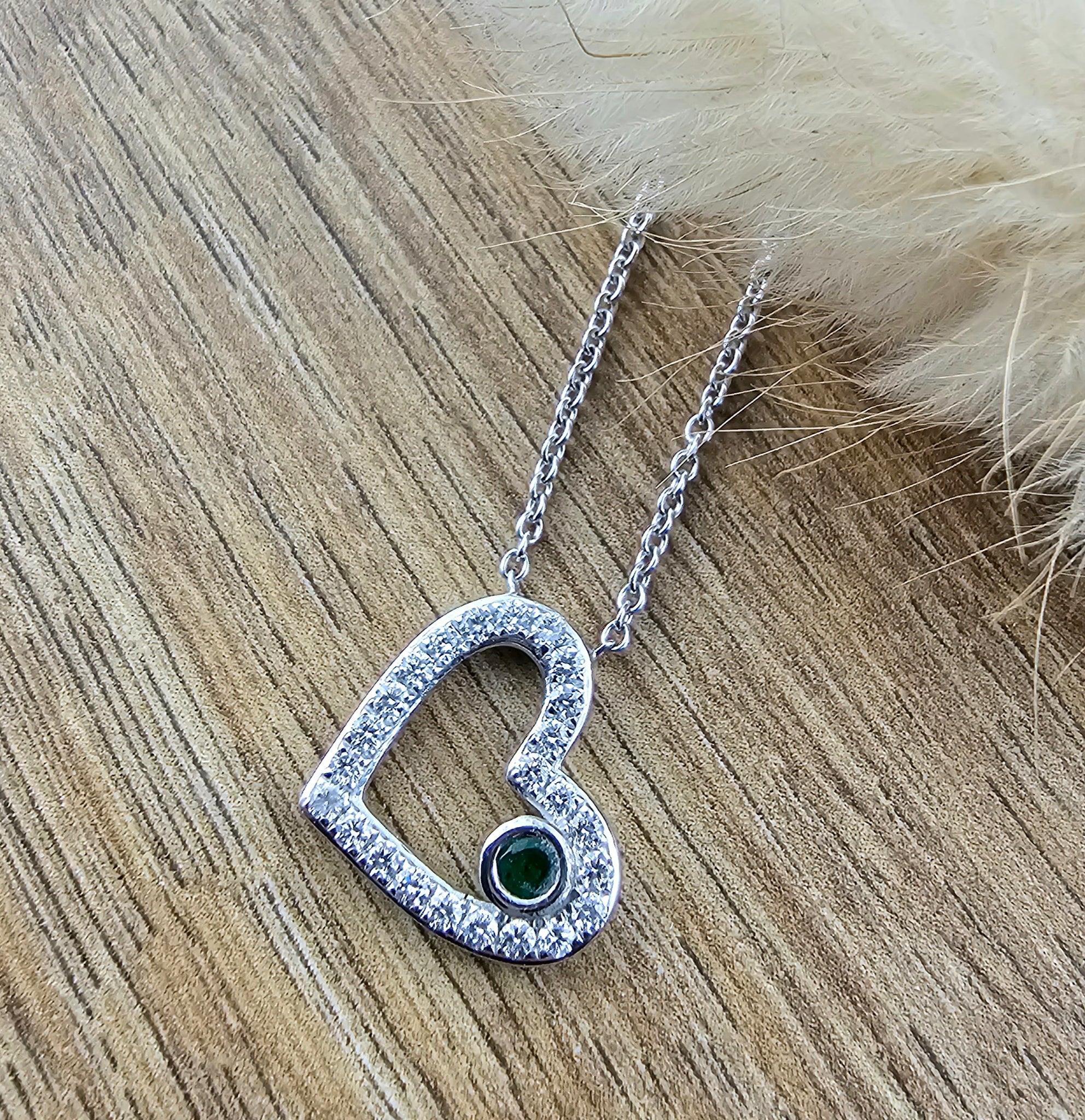 Open heart emerald pendant