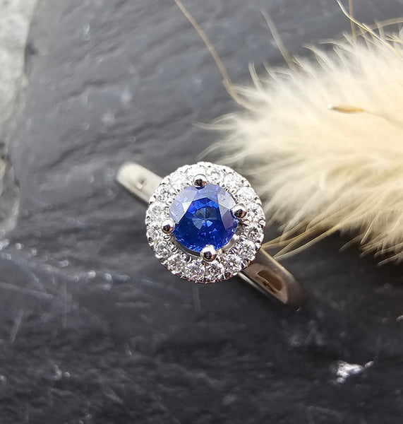 Round blue sapphire halo ring