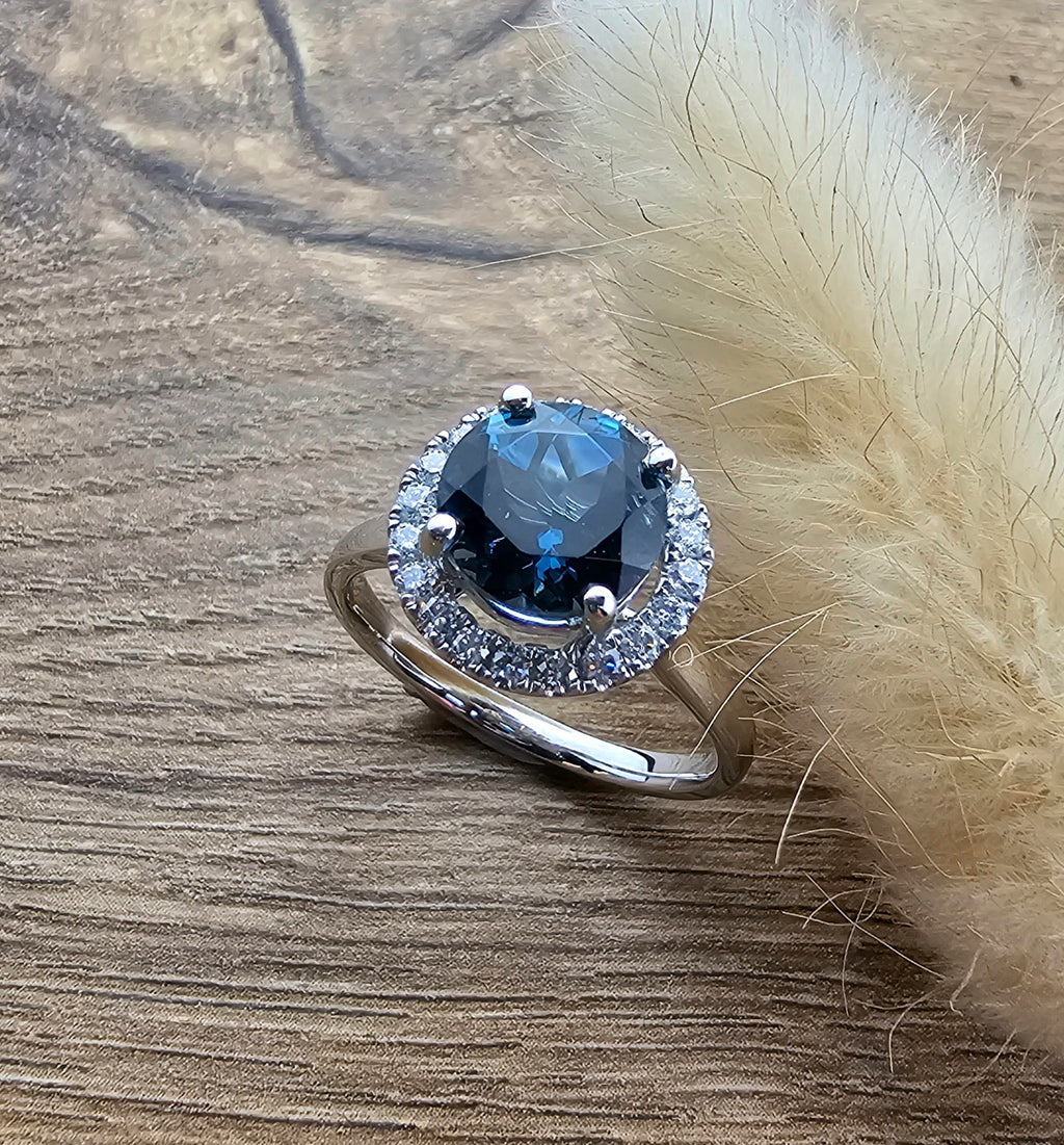 London blue topaz round halo ring