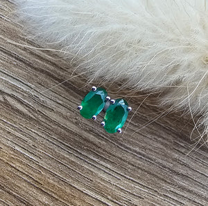 Small oval emerald stud earrings