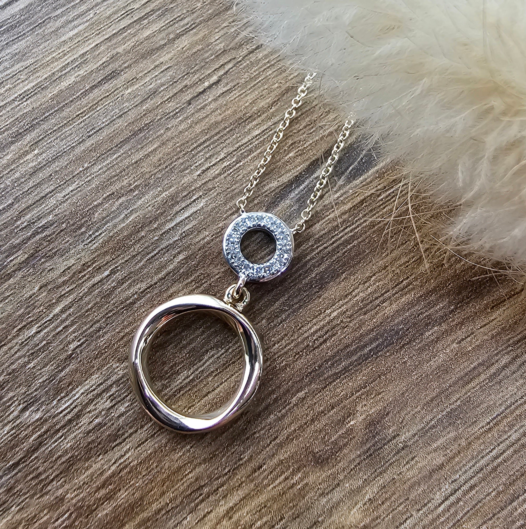 Diamond double circle pendant