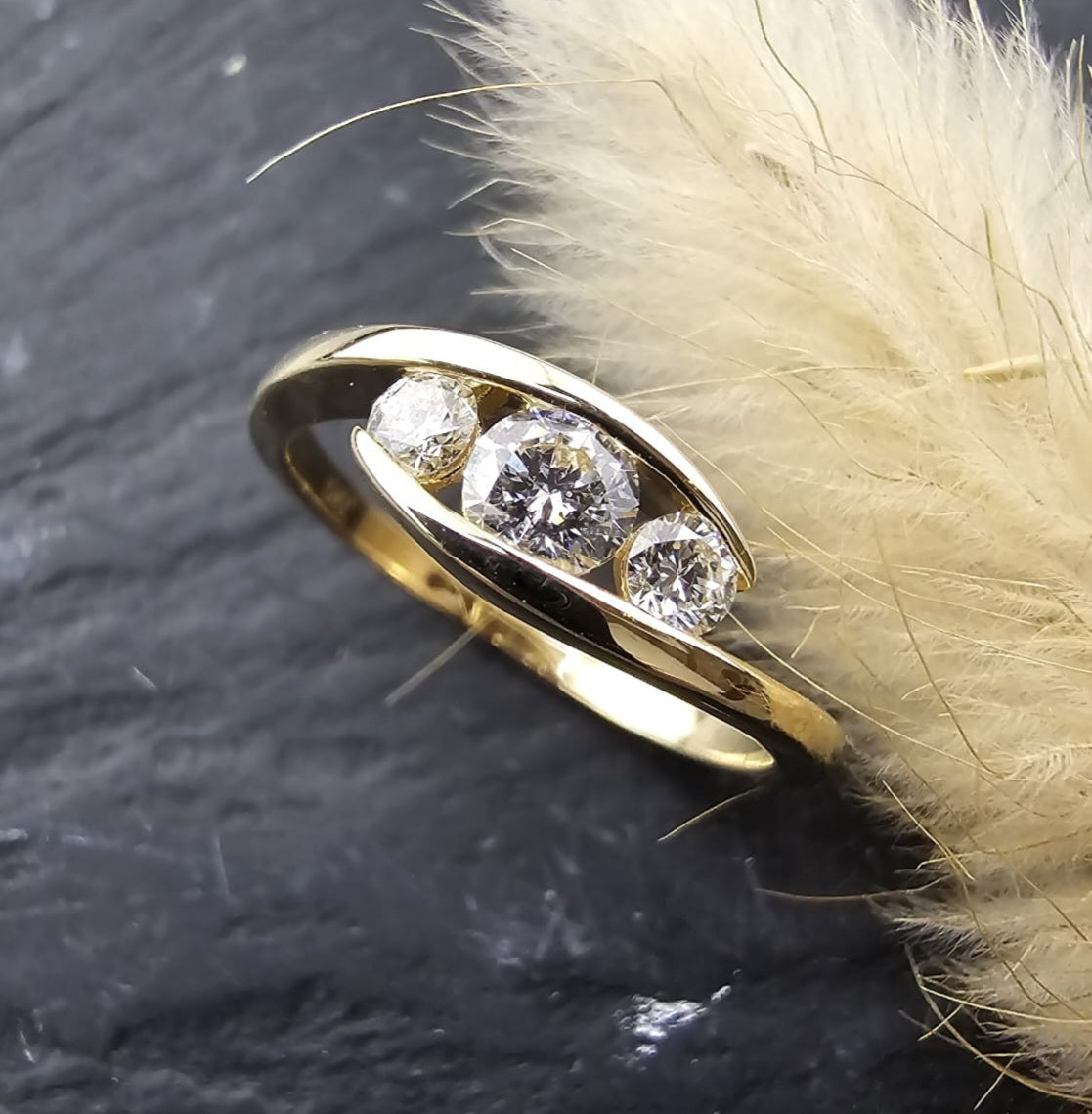 Diamond trilogy tension set ring