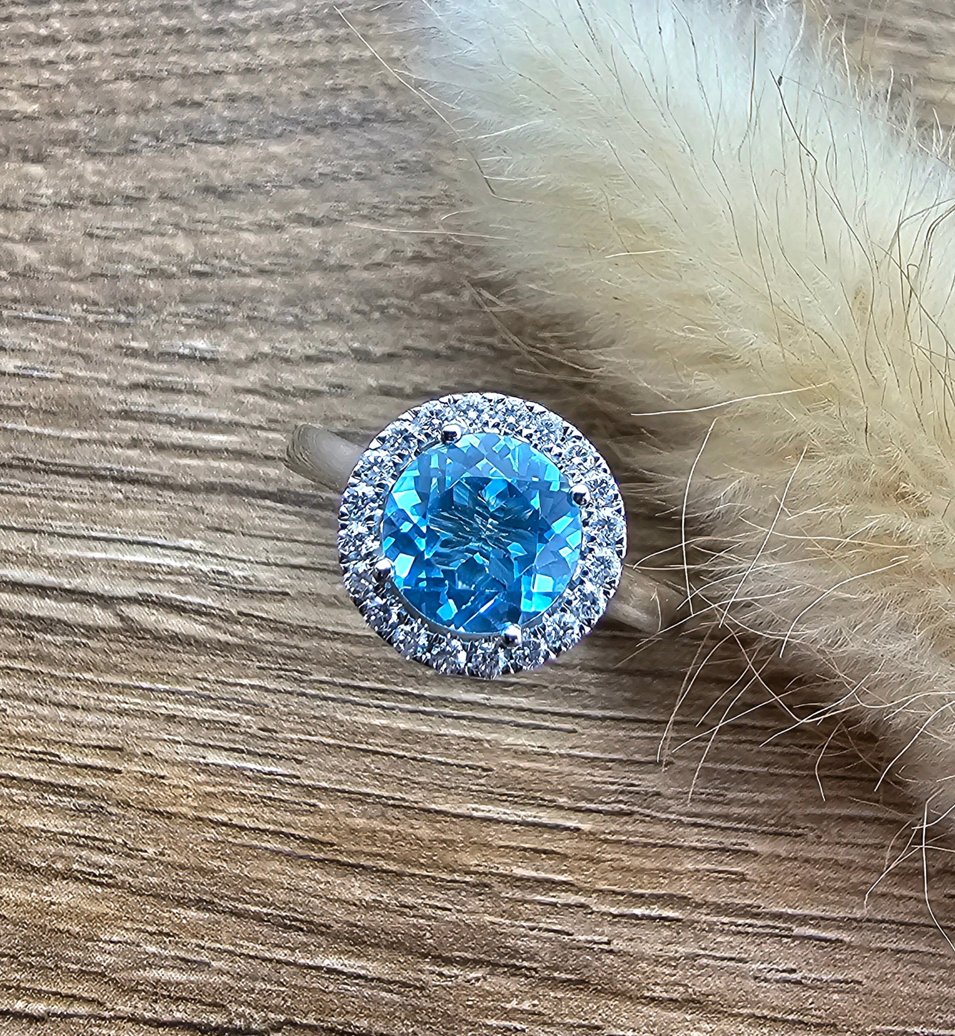 Swiss blue topaz round halo ring