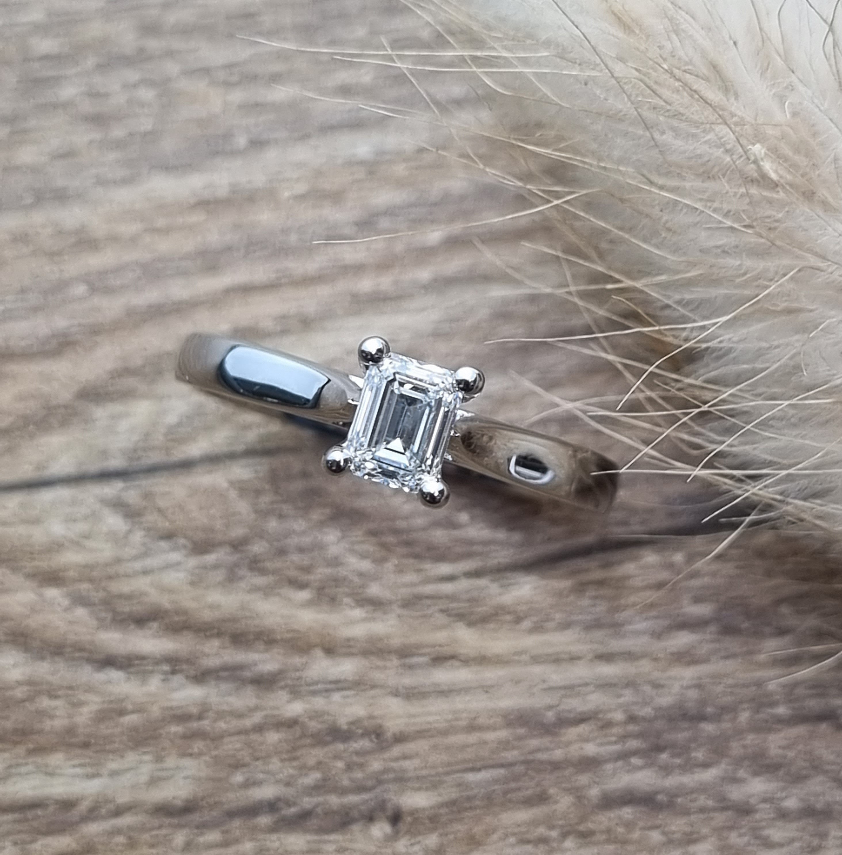 Emerald cut diamond solitaire ring