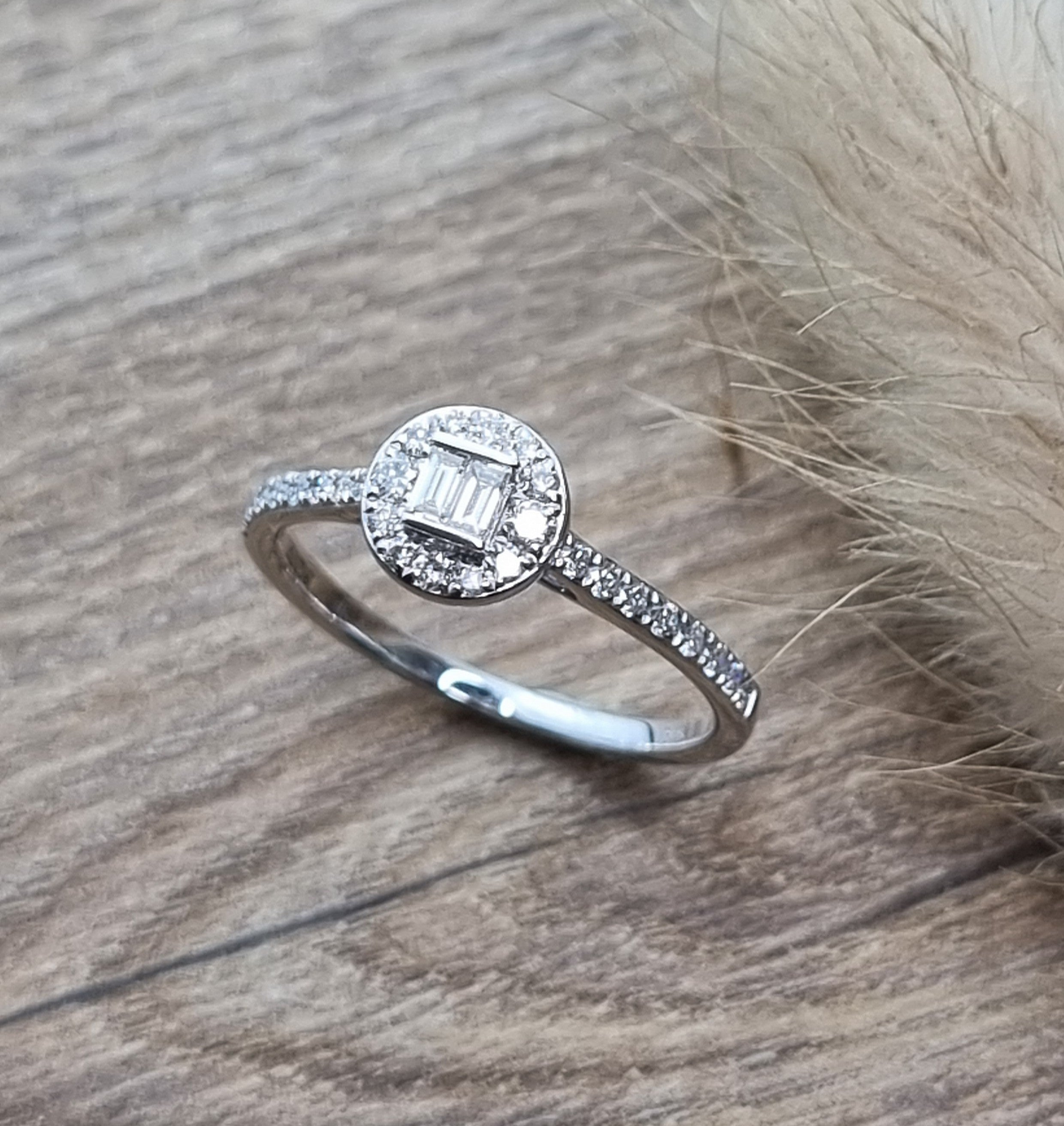 Baguette and round diamond halo ring