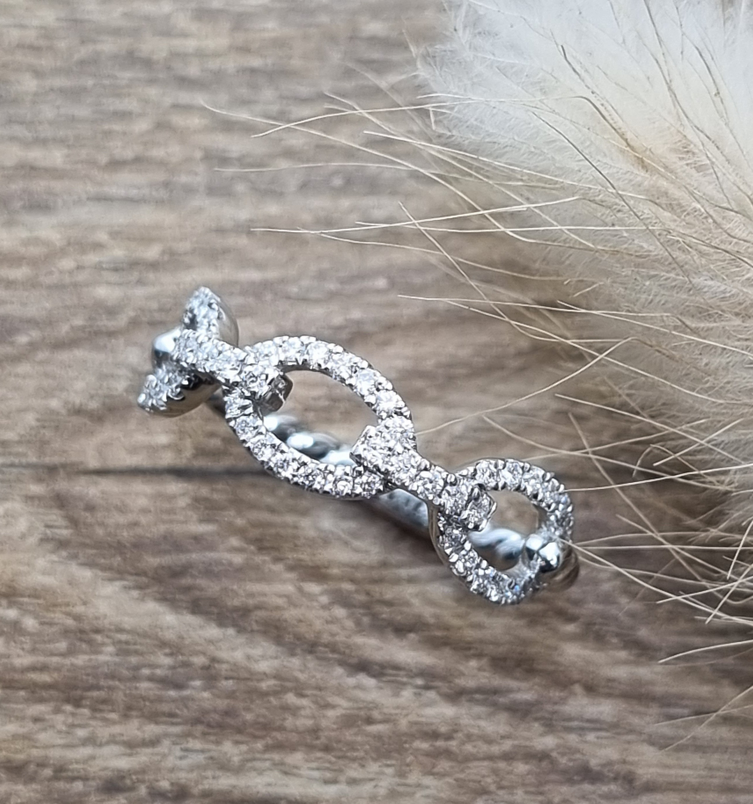 Diamond buckle style dress ring