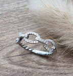 Diamond buckle style dress ring