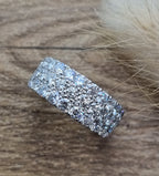 Three row claw set diamond ring