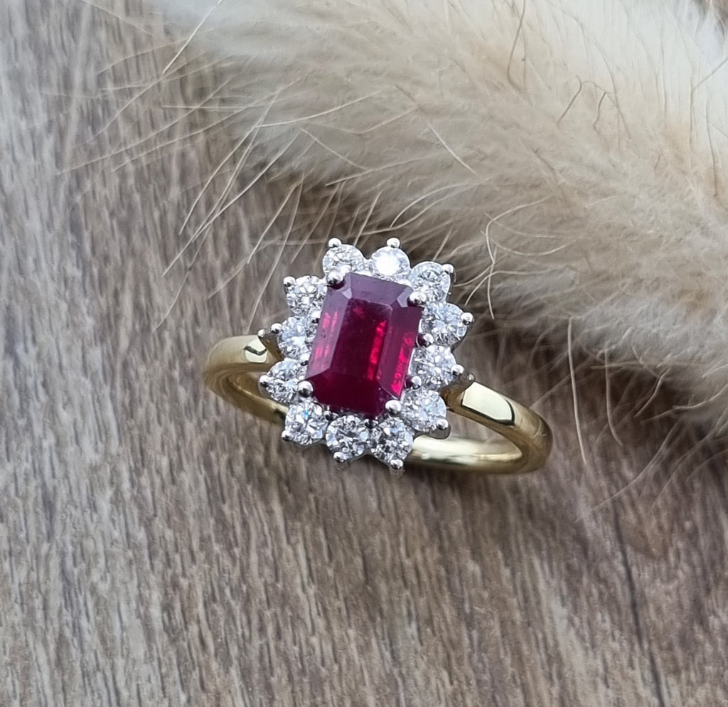 Emerald cut ruby and diamond cluster ring