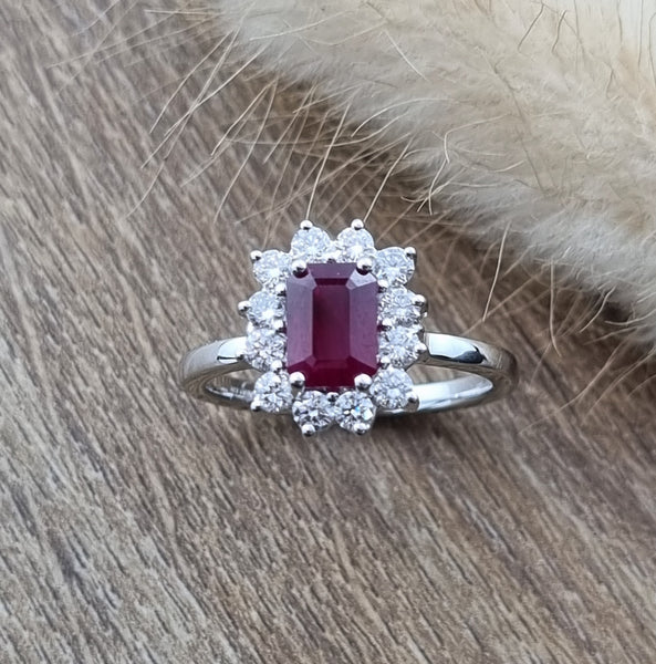 Emerald cut ruby and diamond cluster ring