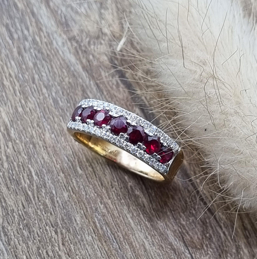Ruby and diamond claw set dress ring