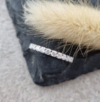Platinum scalloped claw set diamond band (0.50ct)