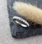 Platinum scalloped claw set diamond band (0.50ct)