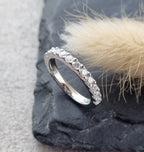 Platinum scalloped claw set diamond band (0.75ct)