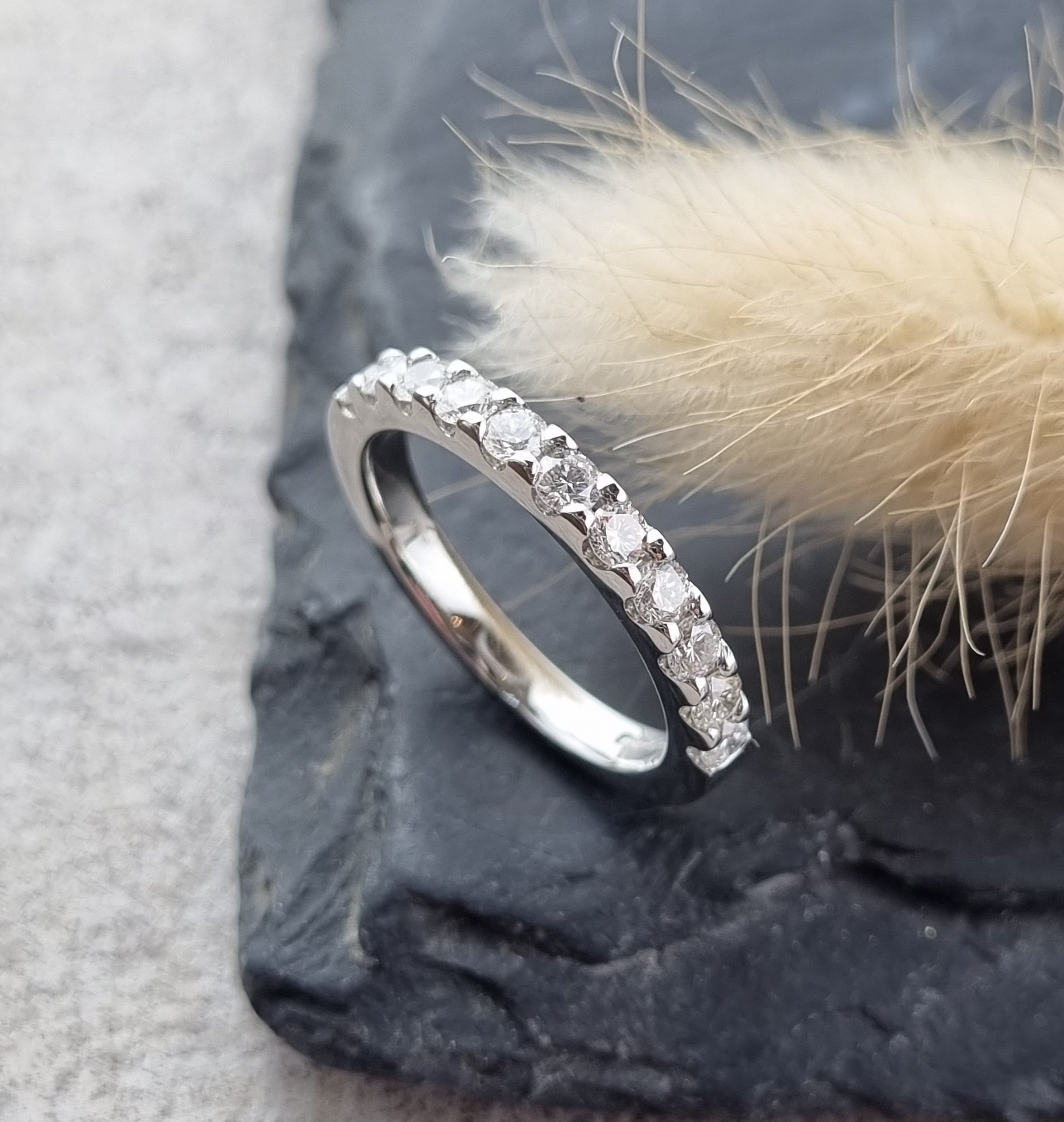 Platinum scalloped claw set diamond band (0.75ct)