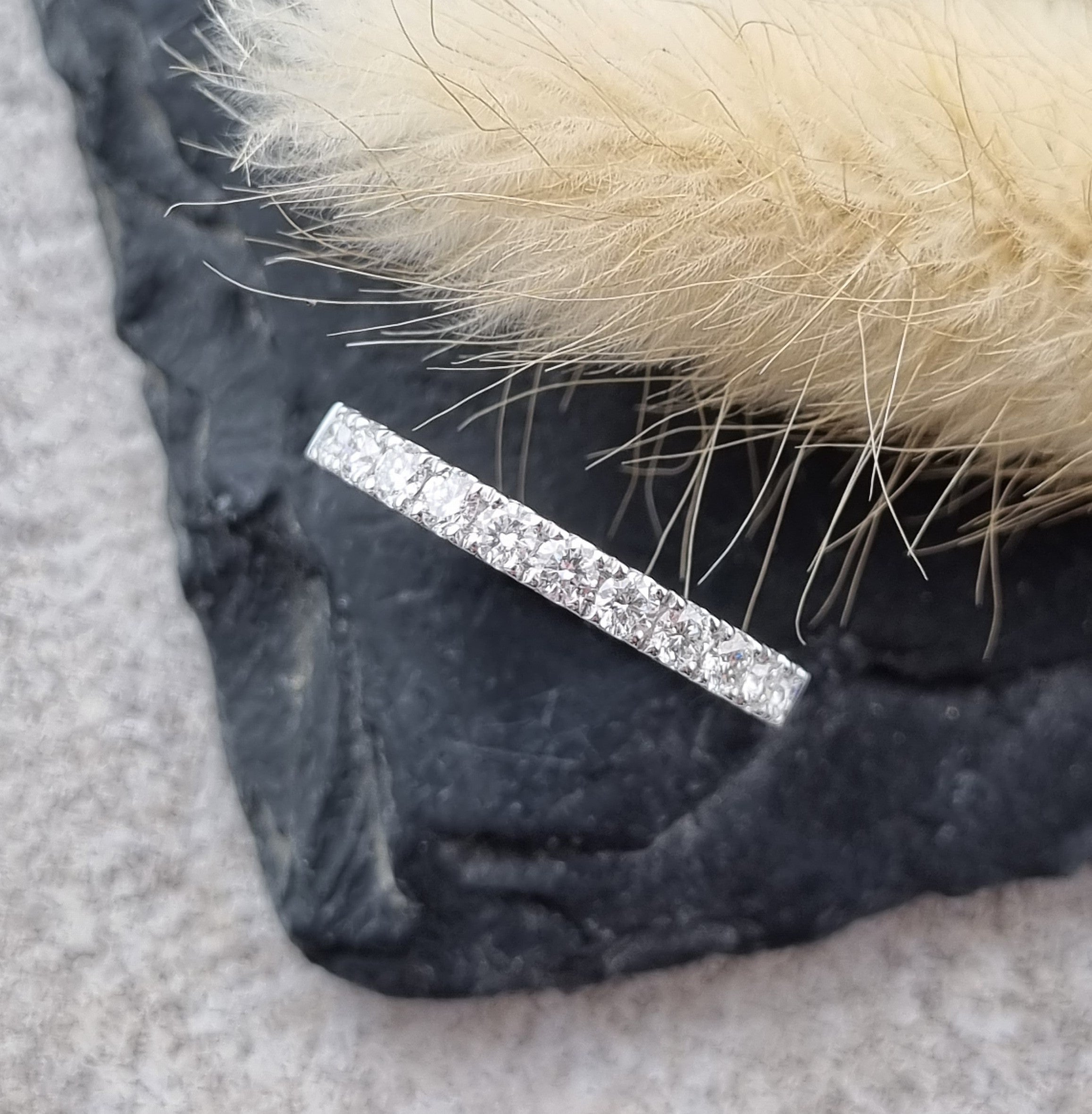 Platinum micro-claw set diamond band