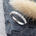 Platinum micro-claw set diamond band