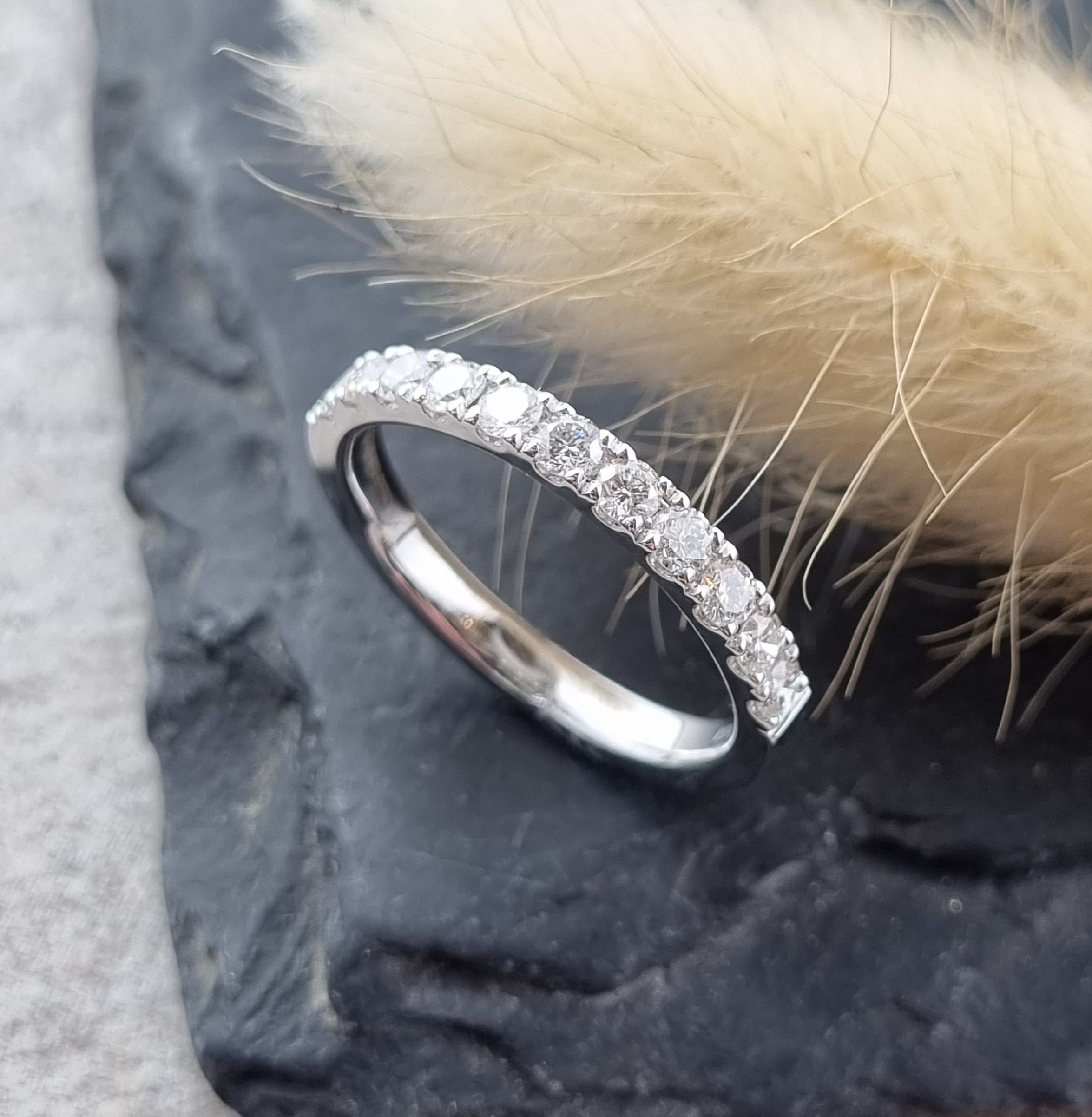 Platinum micro-claw set diamond band
