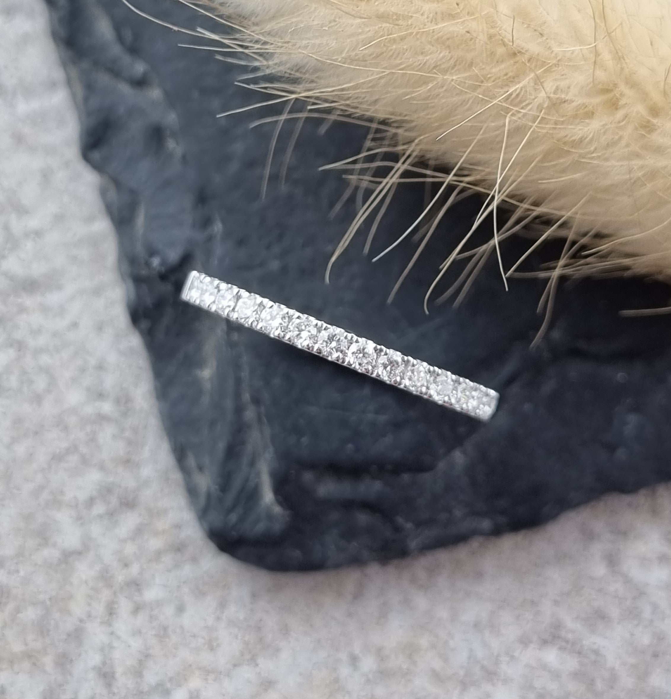 Platinum micro-claw set diamond band