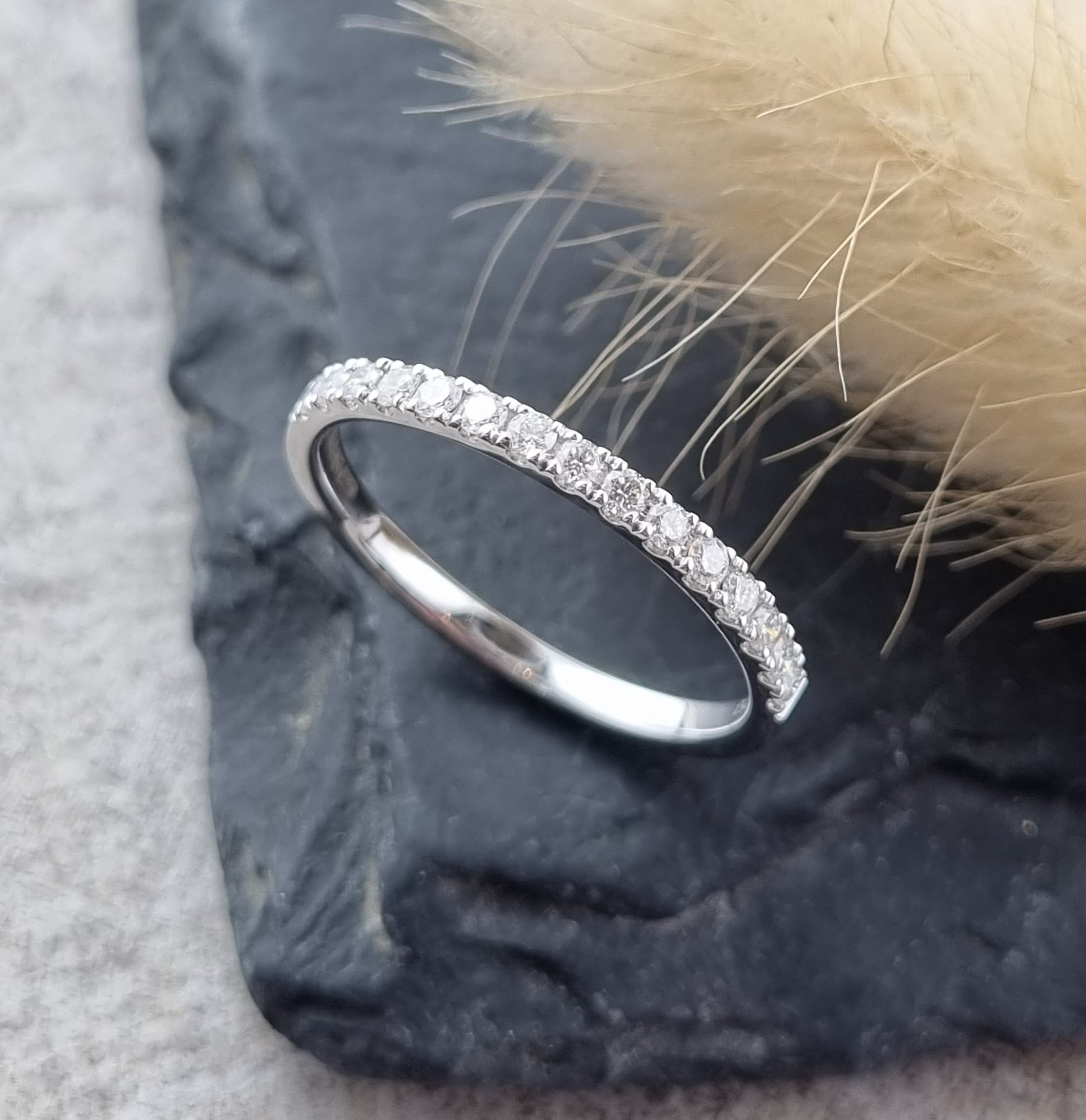 Platinum micro-claw set diamond band