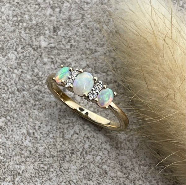 Oval opal and diamond dress ring