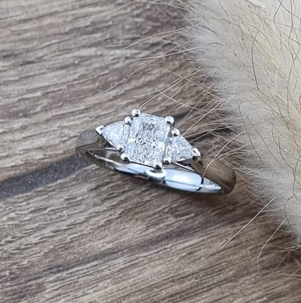 Radiant and trillion cut diamond ring