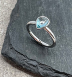 Blue topaz ring