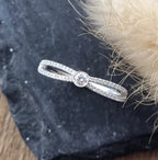 Split shoulder diamond solitaire ring