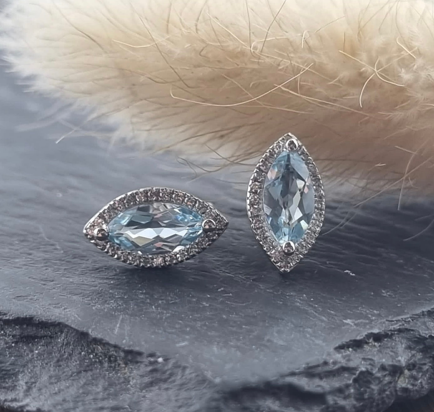 Marquise cut blue topaz halo earrings