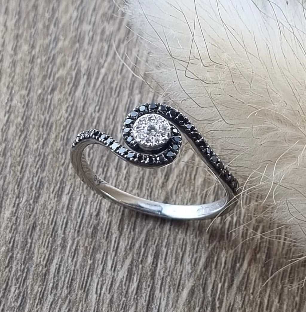 Black diamond swirl ring