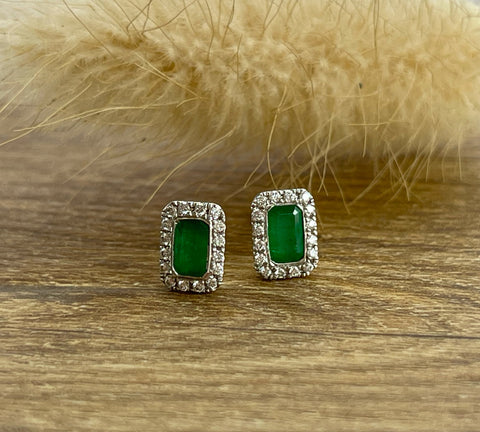 Emerald cut emerald halo stud earrings