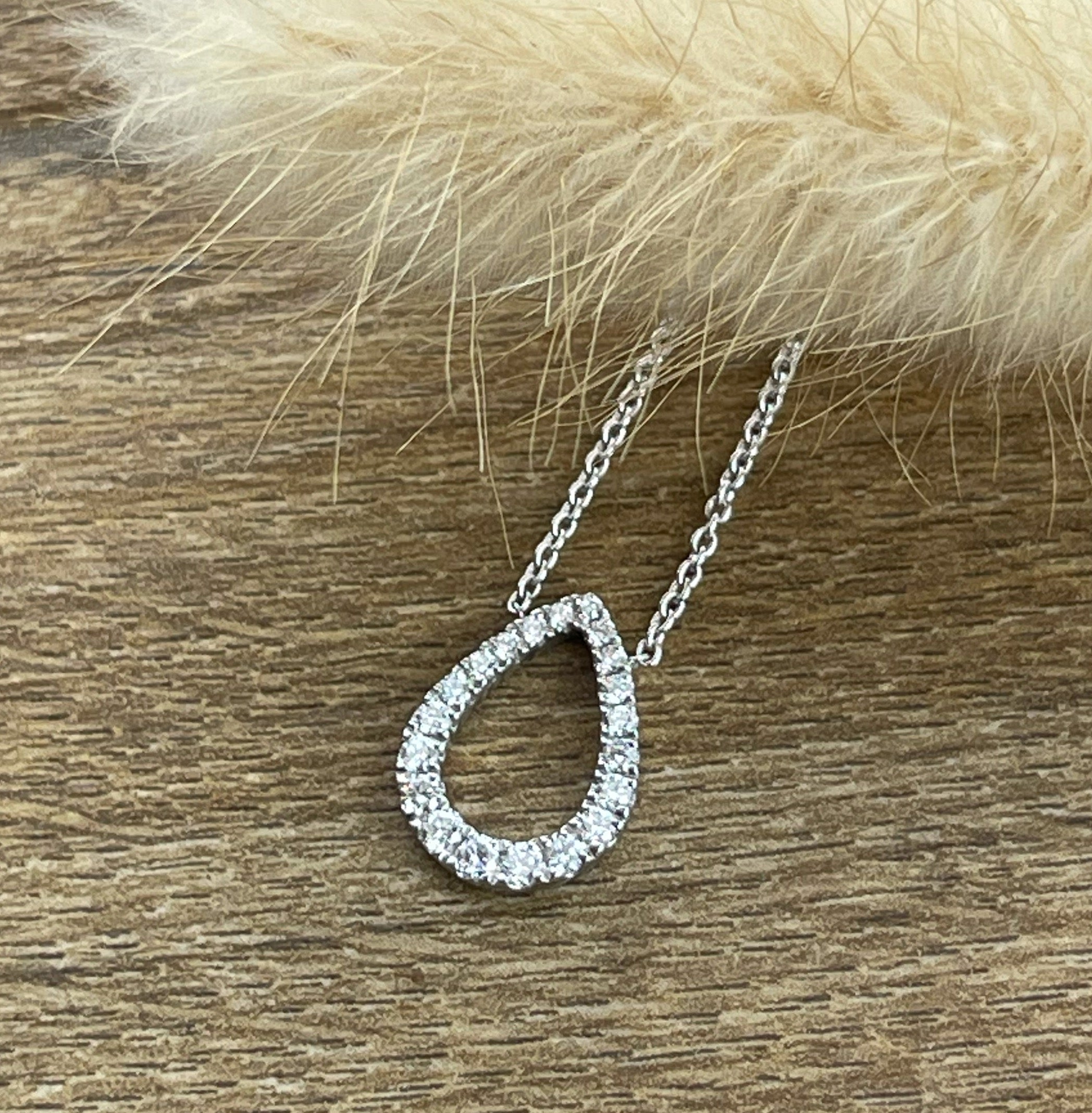 Open teardrop diamond pendant