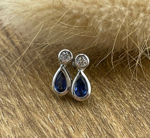 Pear sapphire rubover stud earrings