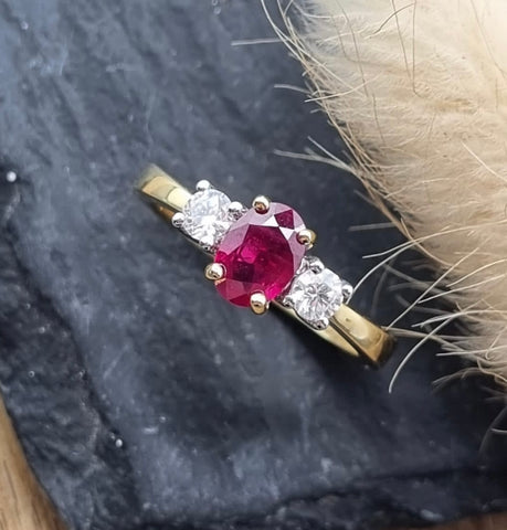 Traditional ruby and diamond three stone ring