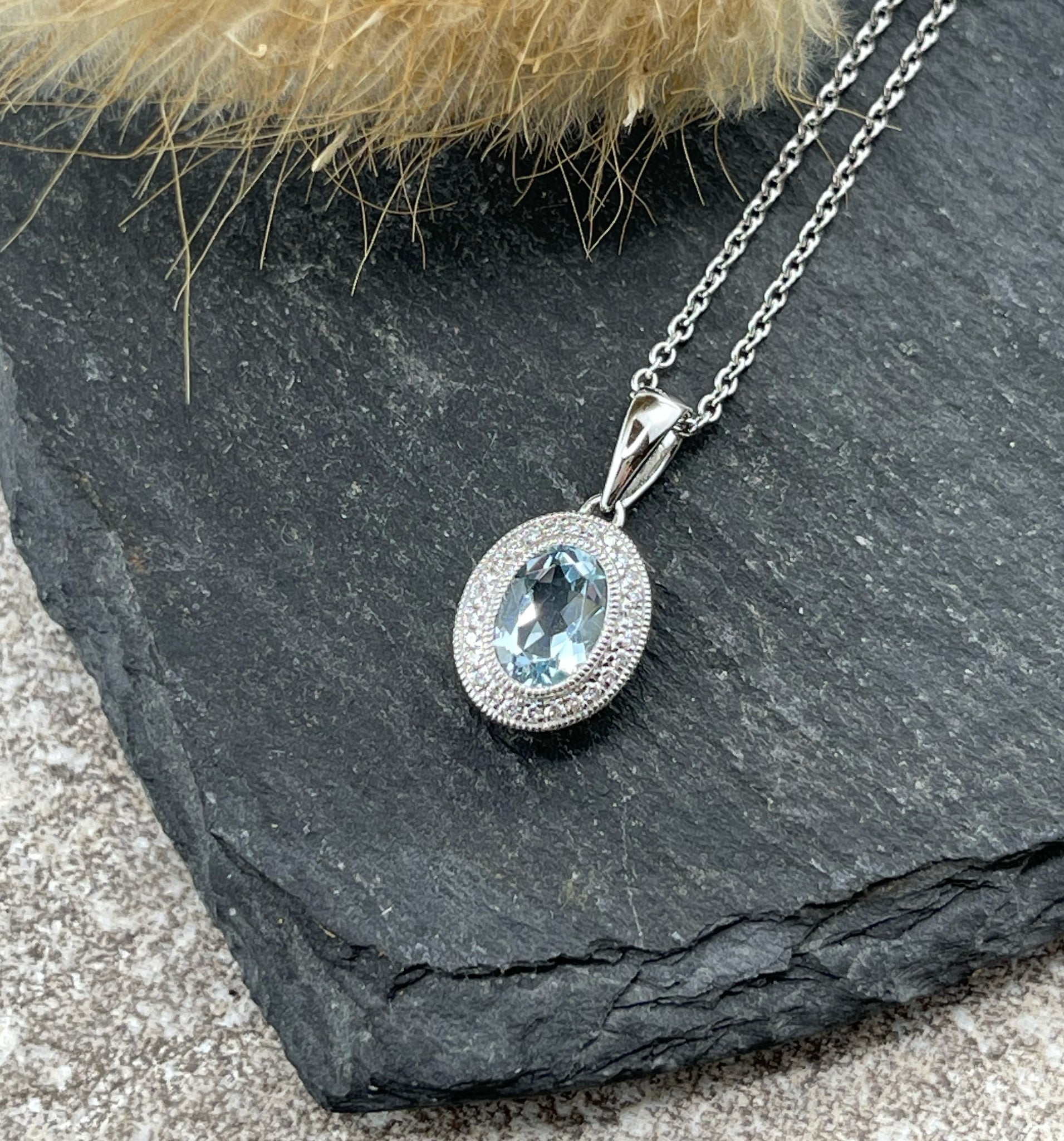 Aquamarine halo pendant