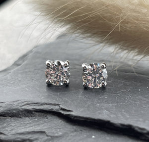 Round brilliant cut diamond stud earrings
