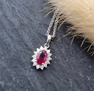 Oval ruby diamond cluster pendant