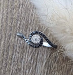 Black diamond swirl ring