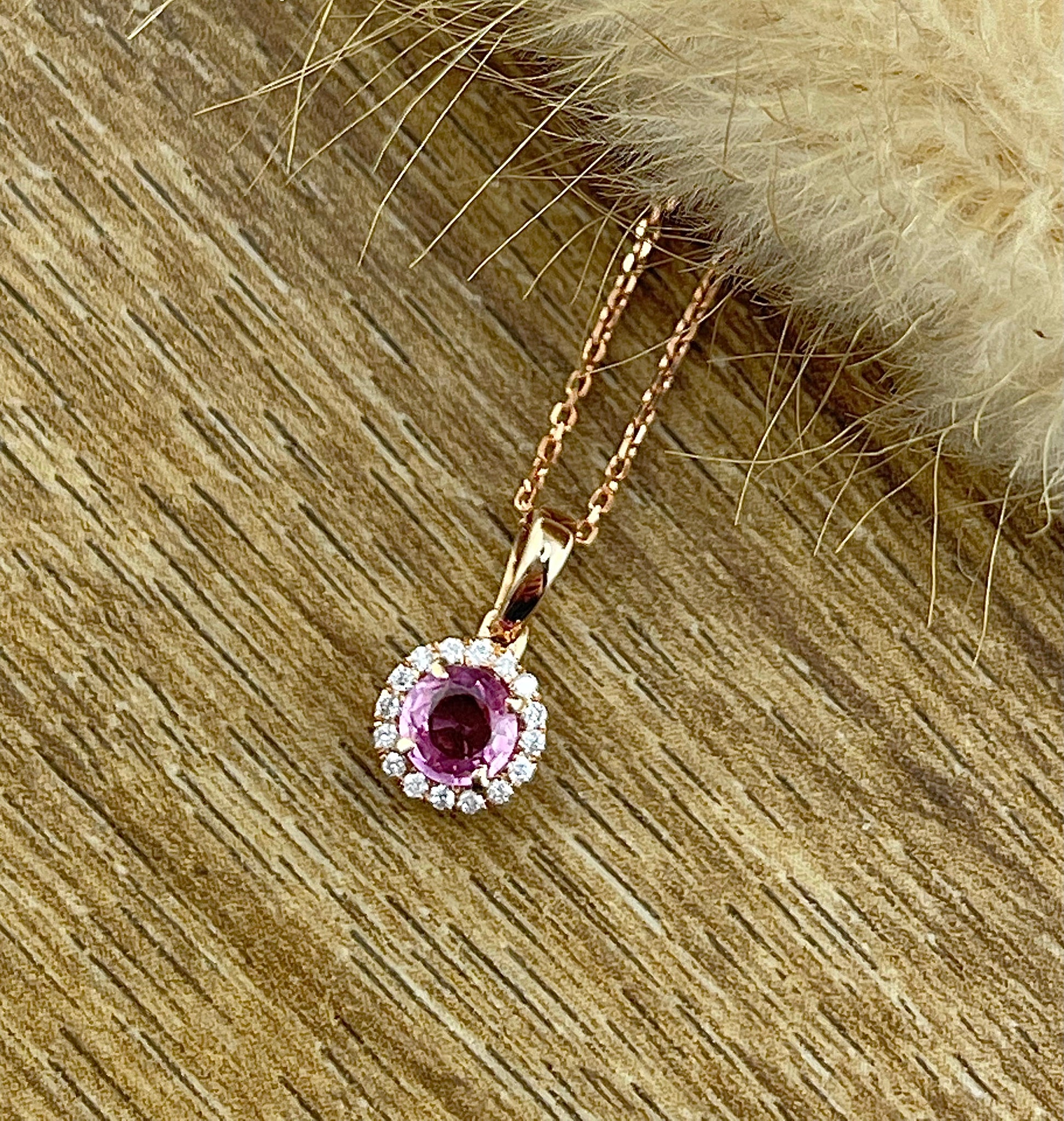 Round pink sapphire halo pendant