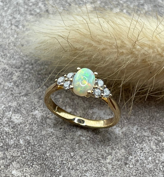 Opal and diamond trefoil ring