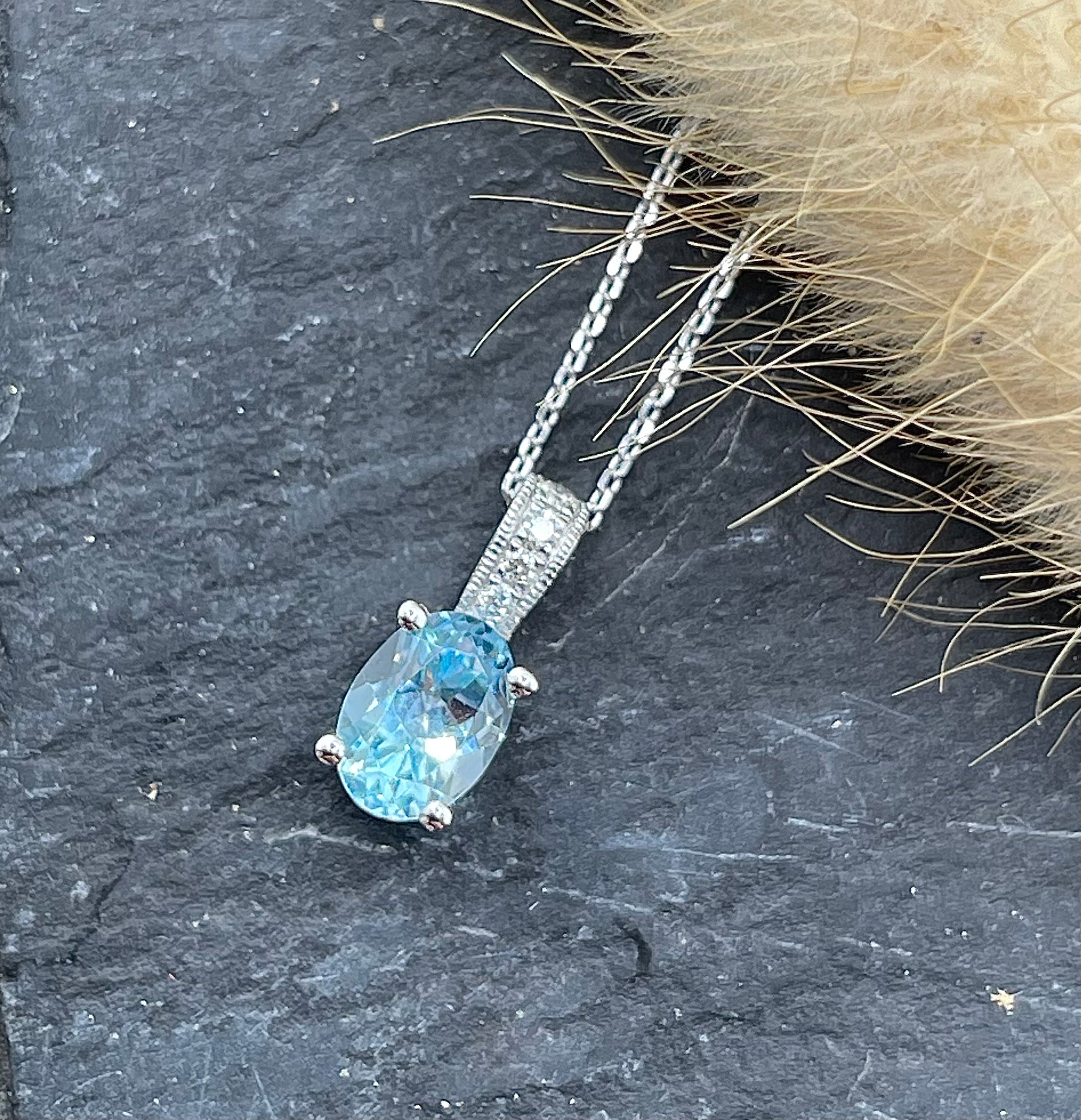 Oval blue topaz pendant